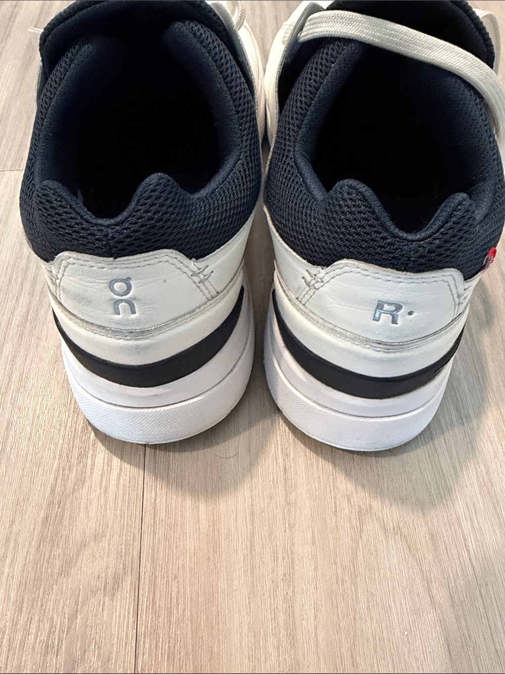 On Running White Sneakers with Black Accents - Picture 4 of 5